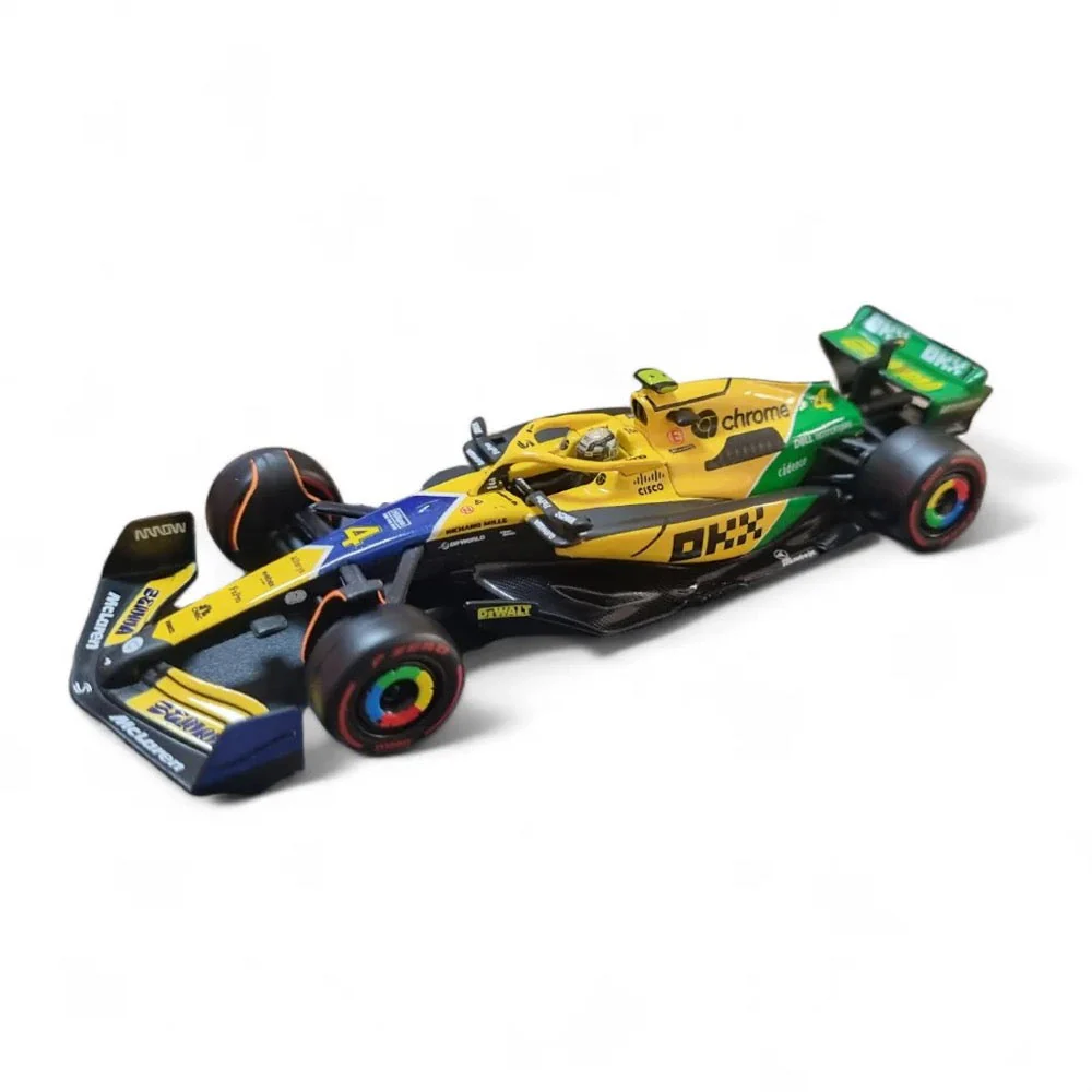 Bburago 01895 1/43 2024 McLaren F1 Senna Livery Driver No.4 Norris with Helmet